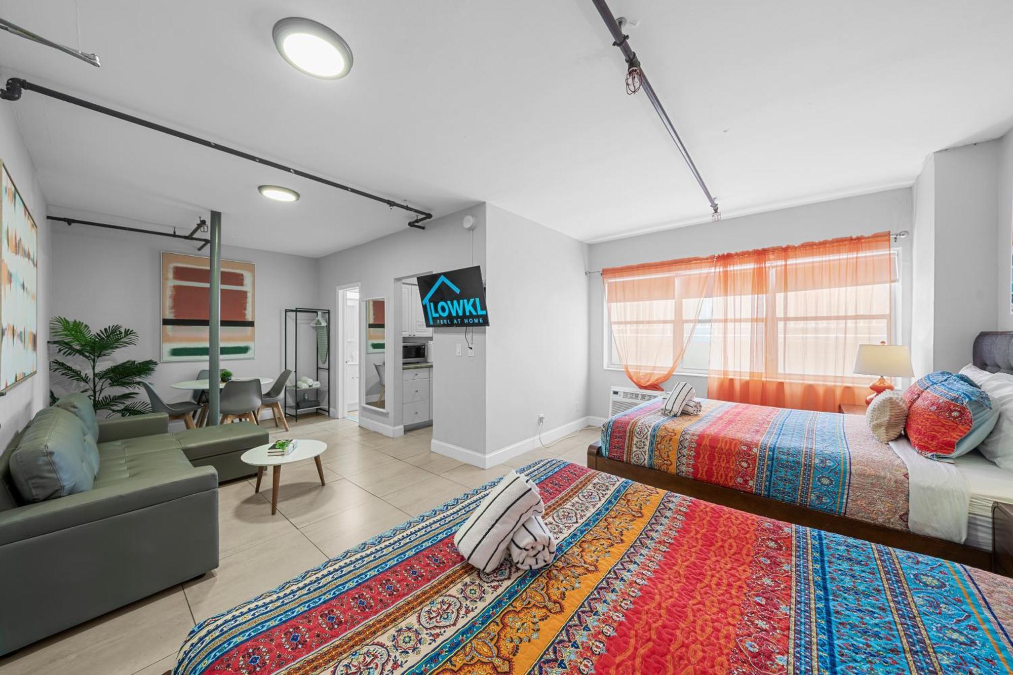 Premium Two Queen Studio with Kitchen and Sofa Bed