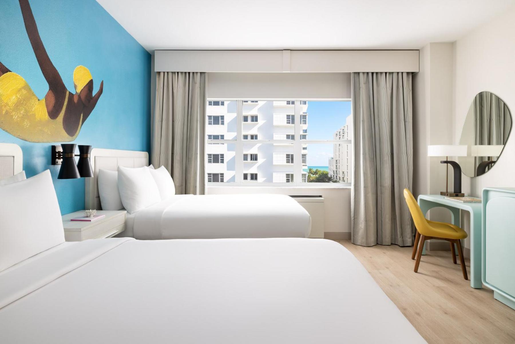 Queen Room with Two Queen Beds and Partial Ocean View,1649061943:JPEG