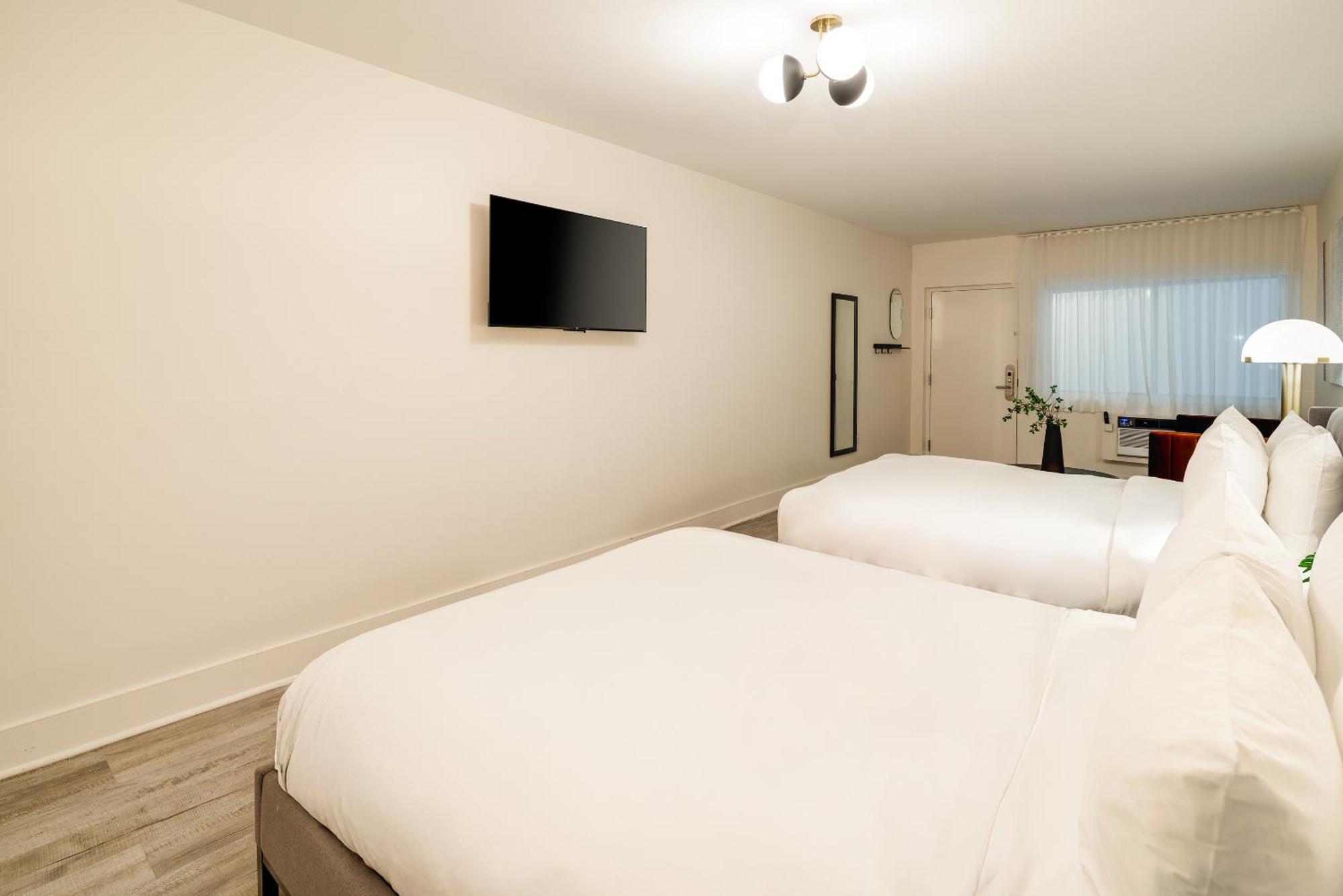 Quarto Duplo Deluxe com Cama Queen-size